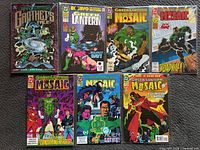 All seven bagged comics laid out for identification