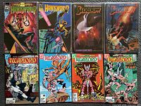 Group shot of all eight bagged comics