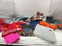 All garments laid out together to show full lot