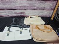 Full lot showing three tote bags and dust bag