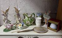 Full group shot of all porcelain and bisque items on table
