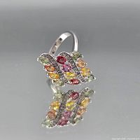 Front view showing multicolor gemstone cluster set in sterling silver