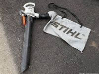 Full view of Stihl BGE 60 blower/vac with nozzle attached and collection bag