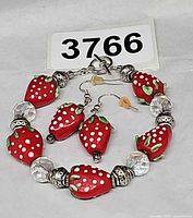 Bracelet and earrings set overview with lot tag