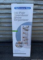 Front view of boxed The Container Store 36-Pair Overdoor Shoe Organizer