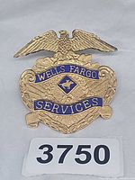Front view showing eagle, enamel text and design