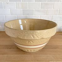 Full view of Robinson Ransbottom yellow ware bowl interior and rim detail
