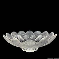 Oblique view of crystal bowl showing scalloped rim, frosted leaf texture, and dew-drop relief