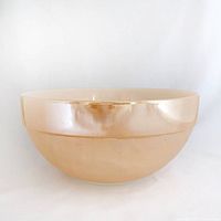 Side profile of iridescent Peach Lustre mixing bowl