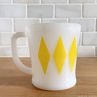 Side view showing yellow diamond pattern and handle