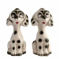 Front view of both Dalmatian puppy shakers showing overall form and painted details