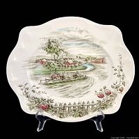 Front view of platter showing pattern and scalloped edge