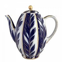 Right side perspective showing cobalt leaf pattern and gold finial