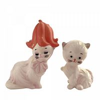 Front view of mother and kitten shakers displaying painted details and overall condition