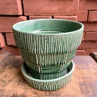 planter angled view showing basketweave texture and saucer