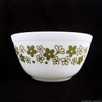 Side view of Pyrex Spring Blossom Green 402 bowl showing floral pattern