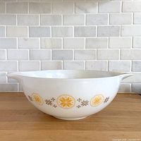 Side view showing pattern, handles, overall condition