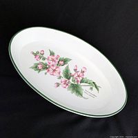 Top view showing interior Marshmallow flower motif and green rim