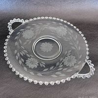 Top view showing Corn Flower cuts, beaded Candlewick rim, dual handles