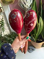 Pair of wooden Bermuda maracas front view