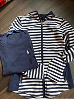 Both garments laid flat showing overall condition and design