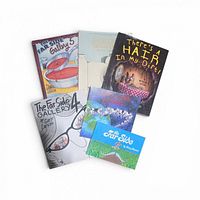 All six books fanned out