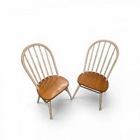 Both two-tone Windsor chairs angled