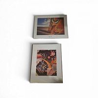 Both matted prints laid out on white background