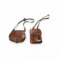 Both leather bags side by side, showing overall forms and straps