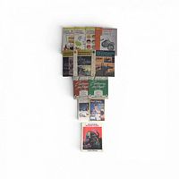 Full view of 11 art instruction and cartooning booklets arranged vertically