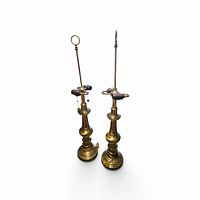 Both brass lamps side by side showing overall design and differing finials