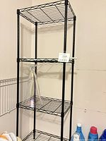Full view of shelving unit front profile showing all four shelves and structure