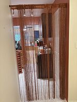 Full view of curtain hanging in doorway