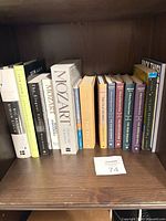 Full shelf view showing all twelve hardcovers