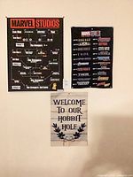 All three posters on wall for overview