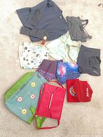 Group shot showing all ten items laid out on floor