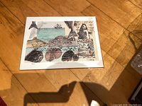 Front view of "Something Fishy" print showing image, signature and edition number in sleeve