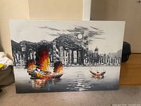 Stretched canvas city-seascape painting with boats