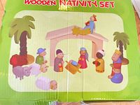 Box front showing Wooden Nativity Set graphic and contents illustration