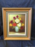Full view of framed rose bouquet painting