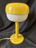 Full view of yellow dome lamp unplugged