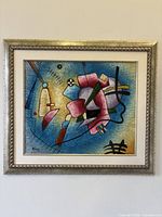 Frontal view of framed abstract painting