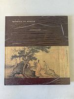 Front cover of shrink-wrapped catalogue showing title and cover art