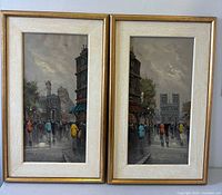 Front view showing both framed paintings side by side
