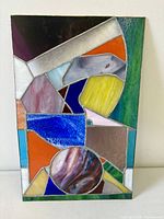 Front view of rectangular stained glass panel showing full design and colours
