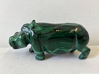 Left side view of malachite hippo showing banded stone