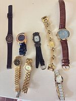 All eight watches laid out together