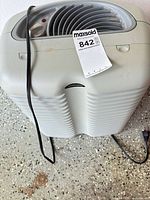 Full view of Vornado vertical air circulator fan showing cord and overall condition