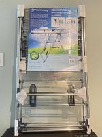Rack in original shrink-wrapped packaging front view
