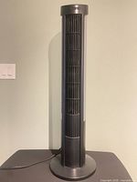 Front view of black and silver tower fan